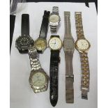 Seven wristwatches