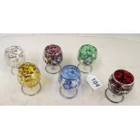 Six small coloured glasses