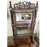 A pierced swing toilet mirror inlaid mother of pearl