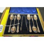 A set of six silver teaspoons and matching tongs (i.c) and two boxes of James Ryals & Co knives in