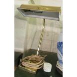 A brass desk lamp