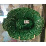 A Victorian green pottery leaf design plate