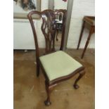 A Chippendale style chair with pierced back on cabriole legs and ball and claw feet