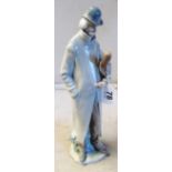 A Lladro model gent with violin case