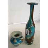 A Mdina glass bottle shaped vase and another turquoise and brown swirl pattern