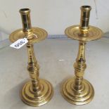 A pair of large Victorian brass candlesticks