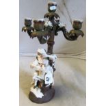 A 19th Century Sitzendorf style candelabra lady with sheep under a tree