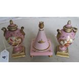A pair of pink lidded vases (slightly a/f) and a pink conical lidded item