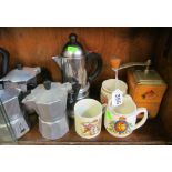 Various French and Bialetti expresso makers, coffee grinders and three commemorative mugs