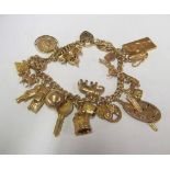 A 9ct gold charm bracelet