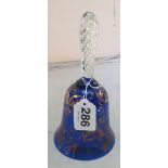 A blue and gilt glass bell with clear airtwist handle