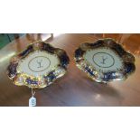 A pair of Chamberlain Worcester oval dishes in the imari colours, central stag crest (gilt rub and