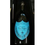 A bottle of Don Perignon Blue Label 2002 champagne in Andy Warhol box