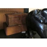 A pair of large ebony elephants, two smaller and two wooden boxes