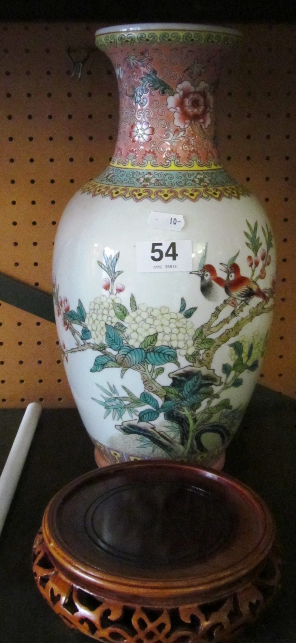 A famille rose vase decorated birds on stand