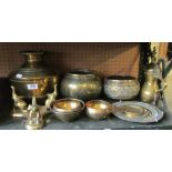 A brass elephant stand and various eastern brass bowls