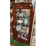 A modern bow front display cabinet