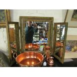 A gilt triple dressing table mirror