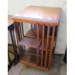 A revolving bookcase with inlaid decoration (base needs tightening