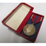 A coronation medal (cased), set of four WW2 medals D V R. F.H. Mocatta