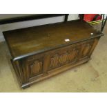 A small carved oak blanket chest