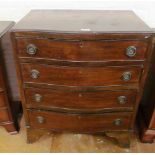 A small mahogany serpentine fronted chest of four drawers