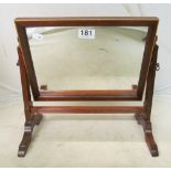 A small mahogany swing toilet mirror with satinwood edging