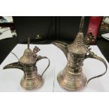 Two late 19th Century white metal Persian coffee pots