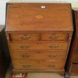 An Edwardian mahogany bureau inlaid shell design (a/f)