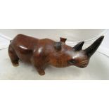 A carved treen rhino