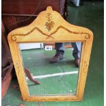 A painted framed mirror
