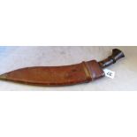 A dagger in a leather holster signed G 11 1918 initialled D H W