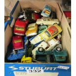 A Schucco car, toy cars and tanks