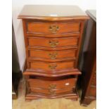 A small chest on stand of six drawers