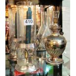 A pair of silver-plated and glass candleholders and a plated lamp