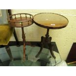 A circular top wine table with gallery and another oval top table