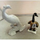 A limited edition Royal Doulton Peregrin Falcon, a Goebbel Canada Goose and a white bird ornament