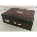 A 19th Century coromandel effect jewellery box with red velvet fitted interior