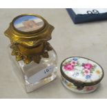 A Victorian scent bottle the gilt top with painted scene of monument and an oval floral pill box