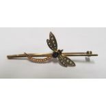 An amethyst and seed pearl dragonfly brooch together with a conch shell and pearl brooch, and a