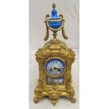 A 19th Century brass and Sevres style porcelain clock (dial cracked)