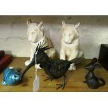 A pair of plaster tiger ornaments, Poole Pottery seal, metal bird and mouse