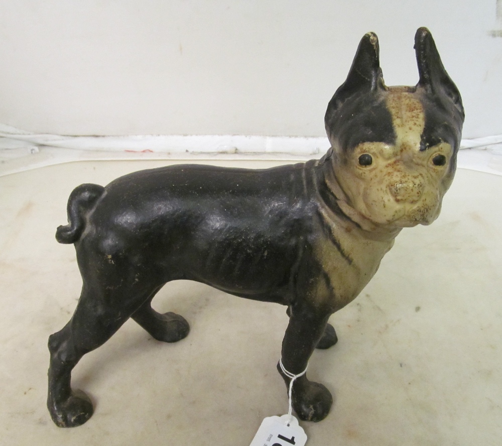 A reproduction metal dog