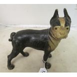 A reproduction metal dog