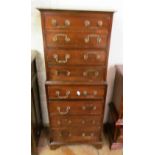 A small mahogany chest on chest of eight drawers