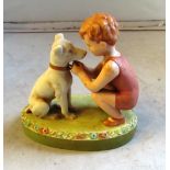 A Royal Dux figure boy with dog