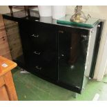 A modern black and glazed sideboard