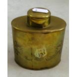 A brass tea caddy