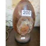 A hardstone egg on stand
