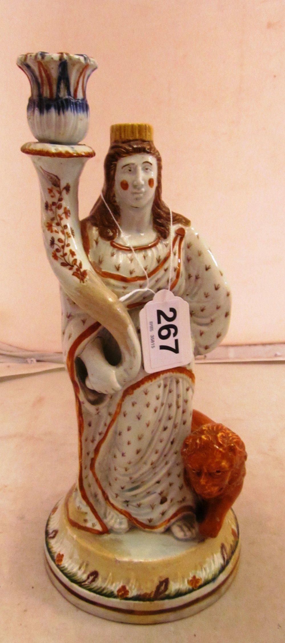 A Staffordshire figure (restored)